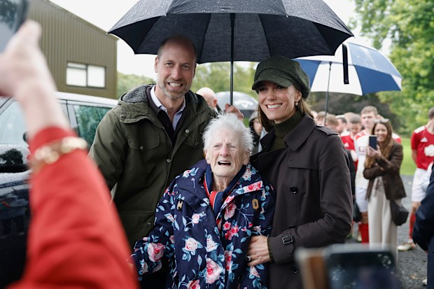 Britain’s Prince William and Kate, Princess of Wales meet local people while visiting Bute Shinty Club in Rothesay, during a royal visit to the Isle of Bute, Scotland, on Thursday, Sept. 17, 2026. 