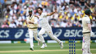 Mir Hamza of Pakistan celebrates the wicket of David Warner.