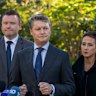 Victorian Premier Ben Carroll (centre), with Tim Richardson (left) and Deputy Premier Gabrielle Williams (right).