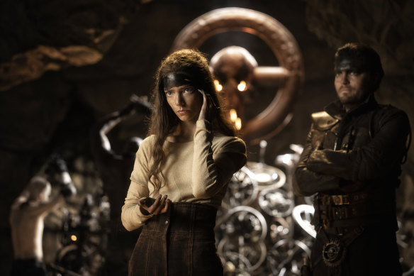 Anya Taylor-Joy as Furiosa and Tom Burke as Praetorian Jack in Furiosa: A Mad Max Saga.