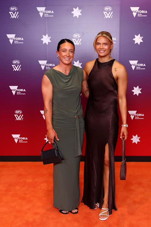 Julia Crockett-Grills (left) and Georgie Prespakis of the Cats.