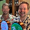 Rob Turner (left) and Justin Lestal at The Exchange Bar and Grill in Warsaw. The Australians are two of the bar’s co-owners.