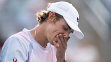 Alex de Minaur blew match point to lose to Cameron Norrie in three sets.