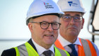 Anthony Albanese and Dan Andrews visit a social housing development site in Prahran on Tuesday.