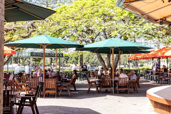 Trees and umbrellas shade the hotel’s large beer garden.