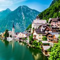 Austria’s lakeside village of Hallstatt is popular with tourists so choose the time and manner of your own visit carefully.