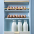 Milk might be better stored towards the back of the fridge instead of in the door.