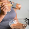 Use your spatula to regularly scrape down the sides of the bowl.