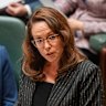 The Treasurer Jaclyn Symes delivers her budget speech in parliament, with Premier Jacinta Allan next to her.