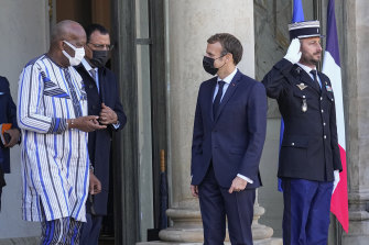 Burkina Faso’s President Roch Marc Christian Kabore, left, is seen here last November in Paris with Niger’s President Mohamed Bazoum, centre, and French President Emmanuel Macron. Kabore has not been seen or heard from since the coup. 
