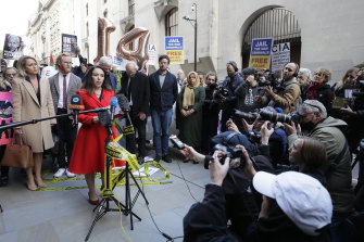 Stella Moris, partner of Julian Assange, gives a statement outside the Old Bailey in London on Thursday.
