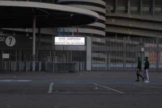 A notice outside the San Siro stadium advises that the game between Inter and Sampdoria has been cancelled.