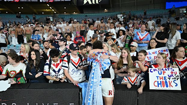 Mark Nawaqanitawase with mum Fiona Tovehi and his fan club after his Roosters debut.