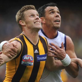 Ryan Crowley on Sam Mitchell during the 2013 AFL grand final.