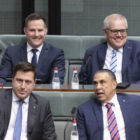 Liberal MP Alex Hawke and former Prime Minister Scott Morrison arrive for Question Time at Parliament House in Canberra on Monday.