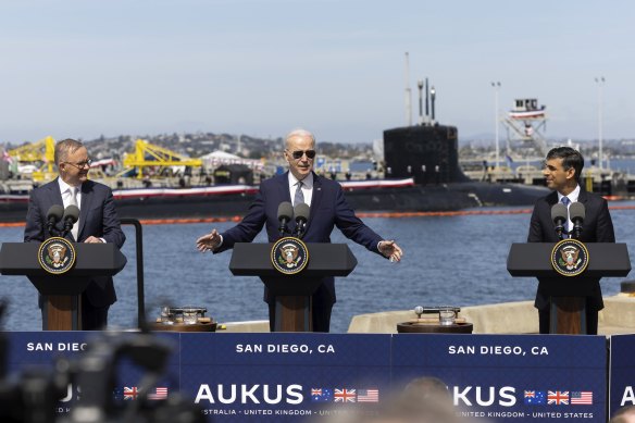 Done deal ... Anthony Albanese, Joe Biden and Rishi Sunak during the AUKUS announcement at Naval Base Point Loma in San Diego on Monday.