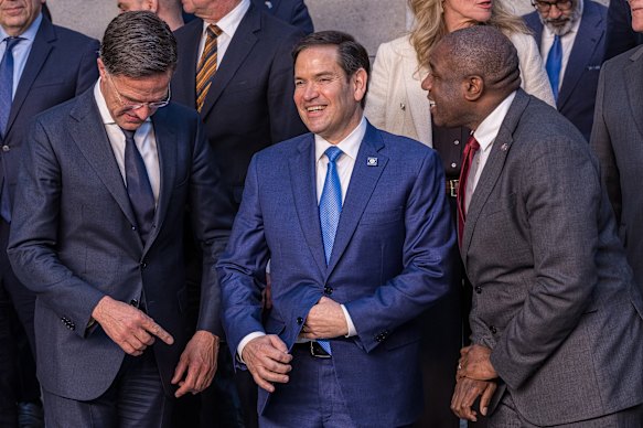From left: NATO Secretary-General Mark Rutte, US Secretary of State Marco Rubio and British Foreign Secretary David Lammy get ready for a press photo in Brussels.