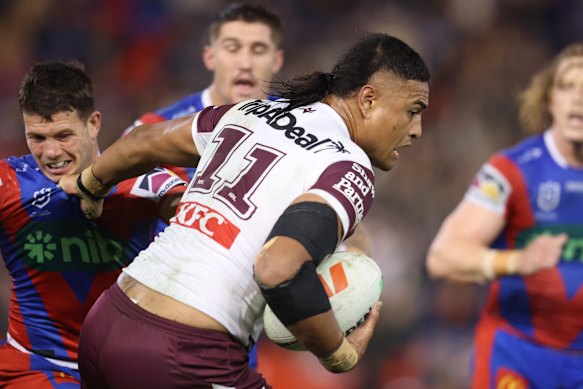 Haumole Olakau’atu takes on the Newcastle defence.