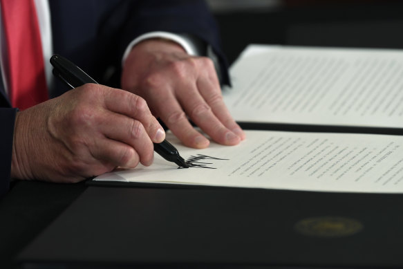 Donald Trump uses a special presidential Sharpie pen. 