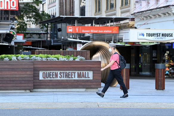 People wear face masks in Queen Street Mall in the Brisbane CBD after Premier Annastacia Palaszczuk announced a three-day lockdown for Brisbane.