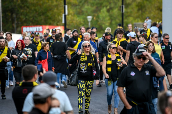 Fans enter the MCG during round one to watch live AFL for the first time in more than 500 days.