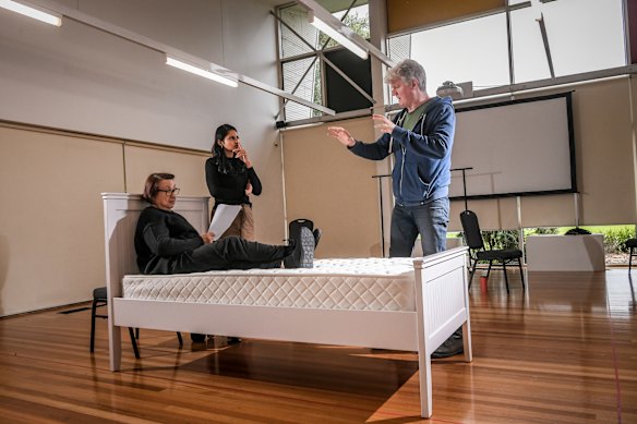 Marcel Dorney directs Marta Kaczmarek  and Rachel Kamath in a rehearsal of Crocodiles. 