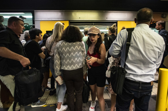 Commuters attempt to depart from North Sydney Station.