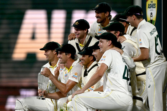 Australia’s players kick off their celebrations after winning the fifth Ashes Test in Hobart.