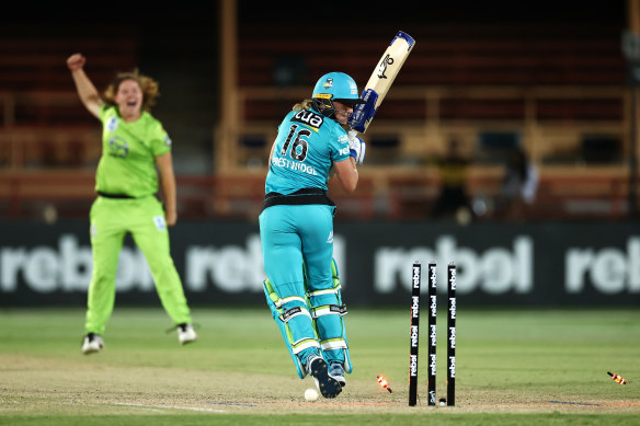 Hannah Darlington bowls Georgia Prestwidge in the Thunder's brilliant comeback in Thursday's second WBBL semi-final.