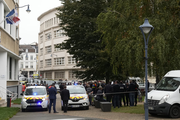 Police forces cordon off the area near the Gambetta high school.