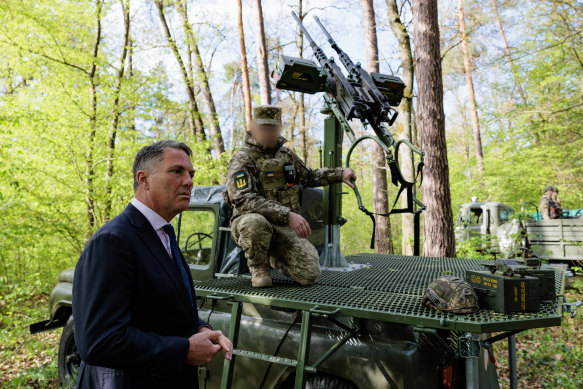 Defence Minister Richard Marles visits Ukrainian troops outside Lviv, near the Polish border, in April.