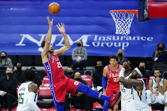 Philadelphia 76ers’ Ben Simmons (25) goes up for a shot.