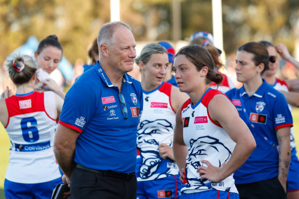 Nathan Burke and Ellie Blackburn of the Bulldogs during their round three game against the Demons at Casey Fields on September 16.