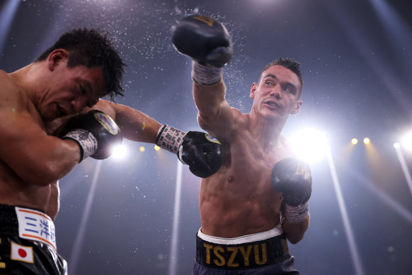 Tim Tszyu punches Takeshi Inoue.