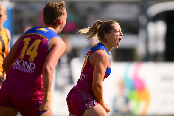 Bella Dawes of the Lions celebrates a goal on Sunday.