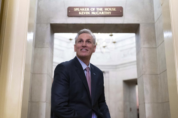Kevin McCarthy stands by the newly installed nameplate at his office after he was sworn in as speaker of the 118th Congress.