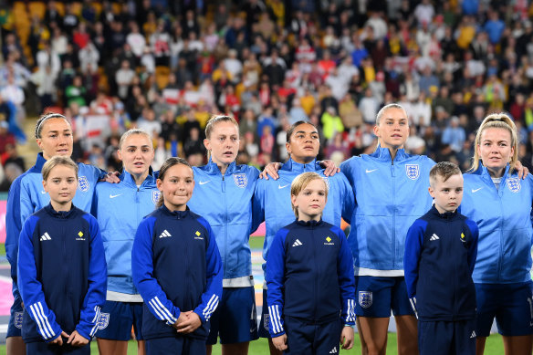 The Lionesses sing the anthem at a sold-out Stadium Australia.