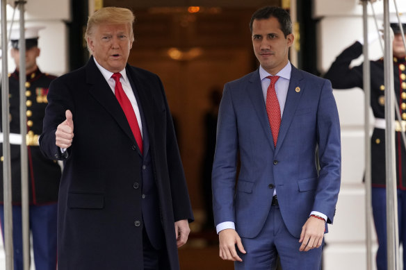 US President Donald Trump welcomes Venezuelan opposition leader Juan Guaido to the White House in February. 