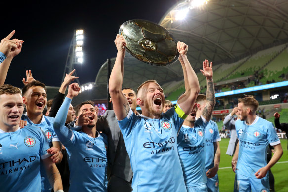 Melbourne City captain Scott Jamieson celebrates his side’s A-League premiership triumph last weekend.