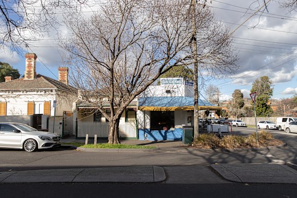 Barton Milk Bar in the corner of the streets of Denham and Barton.