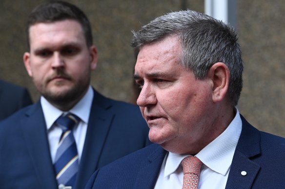 Head of homicide Danny Doherty (right) addresses the media at the Law Courts building in Queens Square following the sentencing of Chris Dawson.