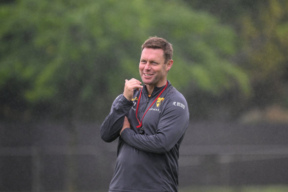 Hawthorn coach Sam Mitchell had a serious bout of pneumonia while on holiday in New York.