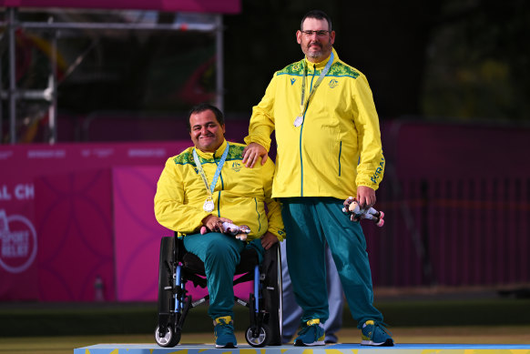 Australia’s Damien Delgado and Chris Flavel after winning a silver medal in the para men’s pairs event (B6-B8).