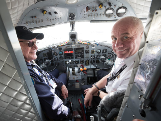 Mike Falls, left, and his son, Mike Falls jnr, owners of Shortstop Jet Charter in the cockpit of their DC-3 ‘Gooney Bird’ airliner that dates from 1945.