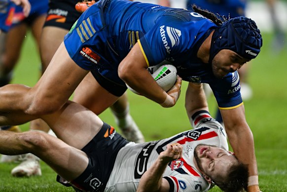 Sam Walker is concussed while trying to tackle Kelma Tuilagi.