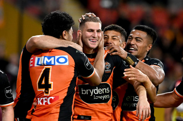 Adam Doueihi celebrates a rare Wests Tigers win.