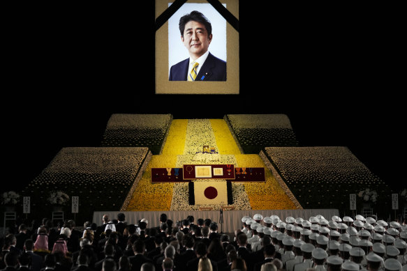 A portrait of former Japanese Prime Minister Shinzo Abe hangs on the stage during the state funeral of former Japanese prime minister Shinzo Abe
