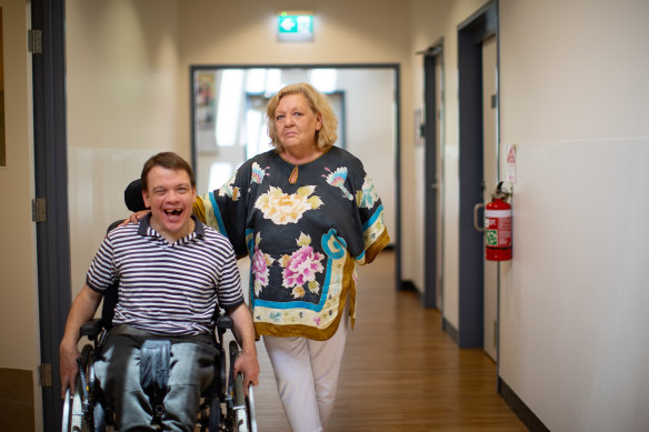 Sandy Guy with her son Liam, who was ripped off and assaulted by his taxi driver.