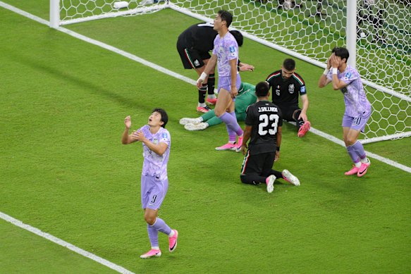 Cho Gue-sung reacts after a missed opportunity for Korea.