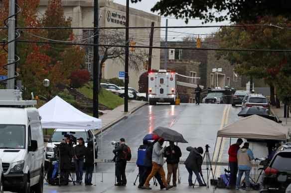 Media tents and vehicles line an intersection near the Tree of Life Synagogue in 2018.